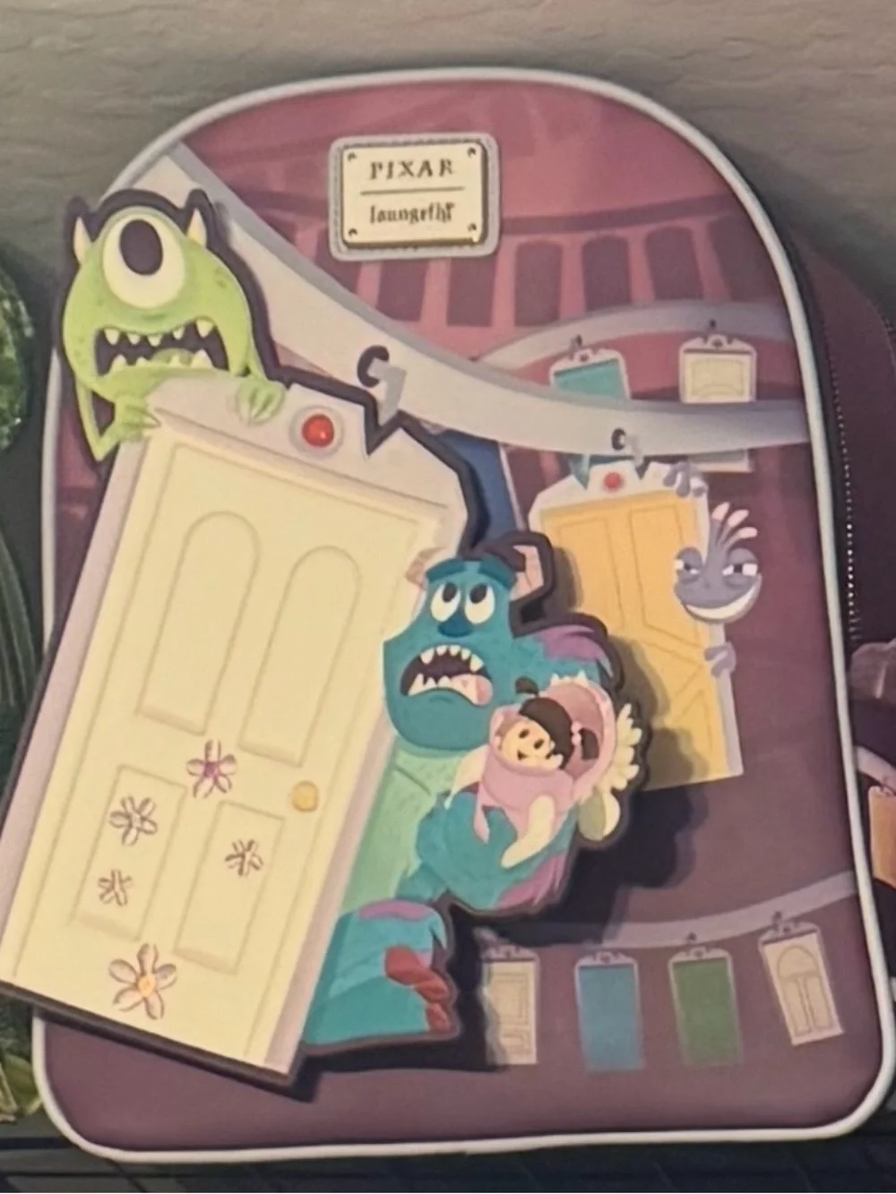 Loungefly Pixar Monsters, Inc. Backpack —NWT